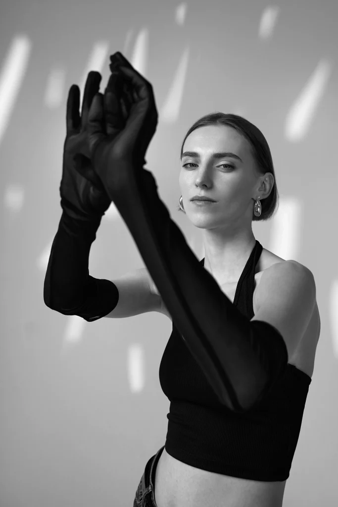 medium-shot-model-posing-with-gloves-black-white-scaled-bdsm ideas