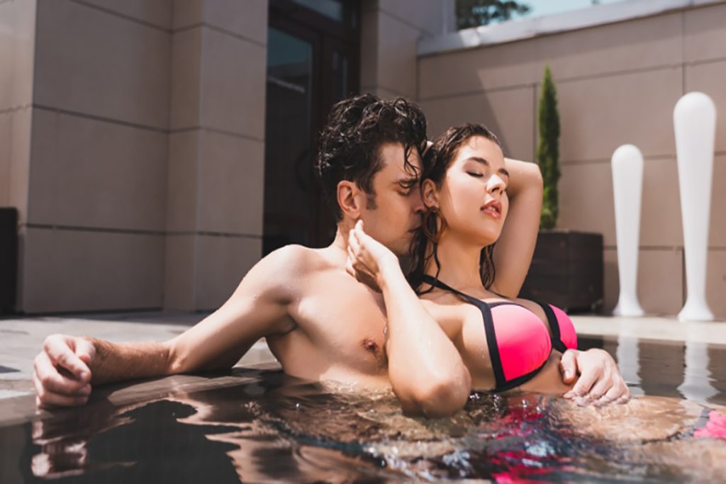 Couple playing in swimming pool-BDSM Safeword