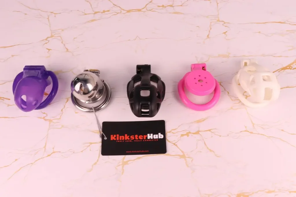 Chastity cages in five different colors, materials, and shapes