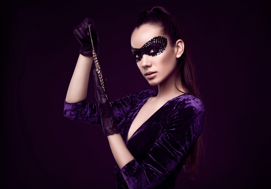 elegant-brunette-woman-sequins-mask-with-black-gloves-looks-diamond-necklace
