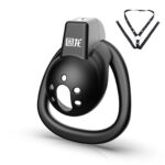 kinksterhub A small black flat chastity cage with a bondage belt and three different sized rings.