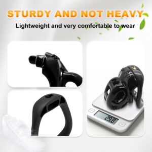 The Weight of Small Short Black Chastity Cage Set display