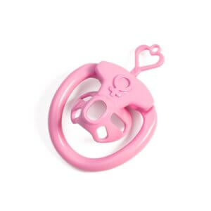 Pink inverted chastity cage front view with key