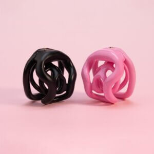 pink resin chastity cage open-frame inverted cock 3D wearing guide graphic