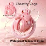 pink chastity cage bow integrated lock rings detail close-up